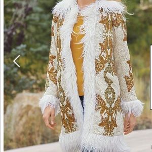 Lace appliqué, faux fur trim jacket. Worn once for picture.